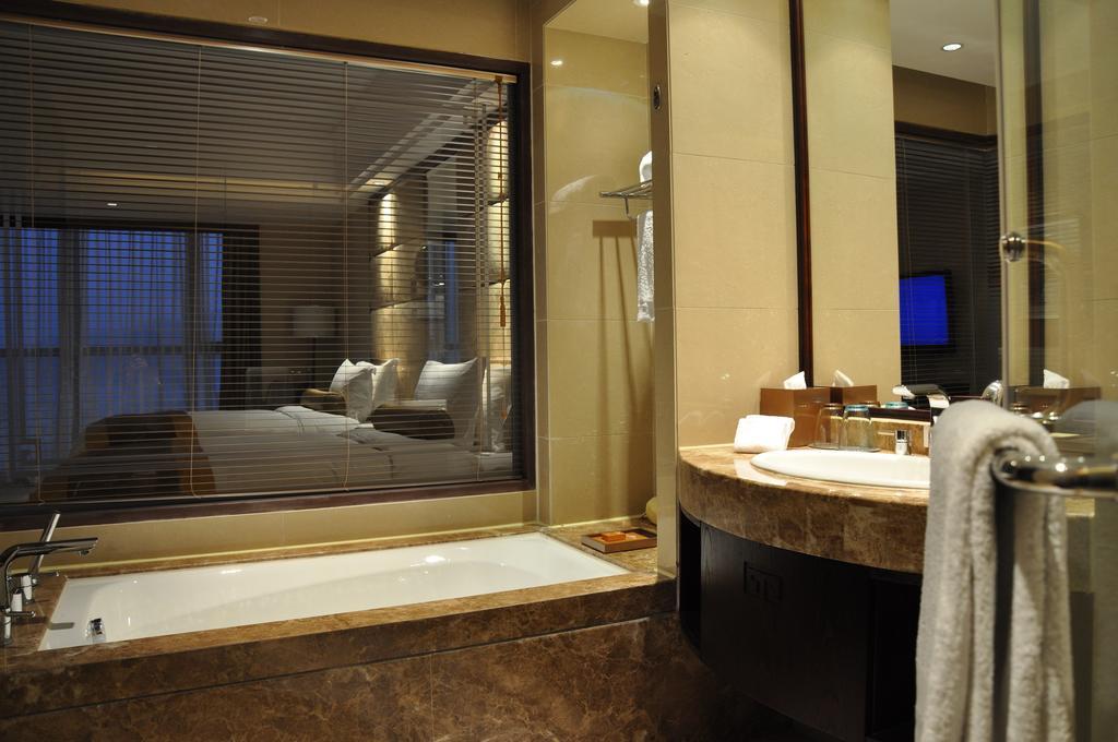 Vienna International Hotel Suzhou University Town Екстер'єр фото