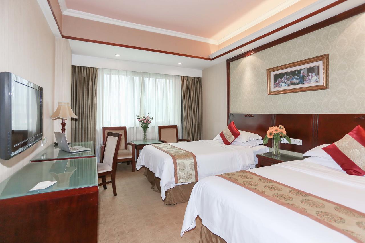 Vienna International Hotel Suzhou University Town Екстер'єр фото