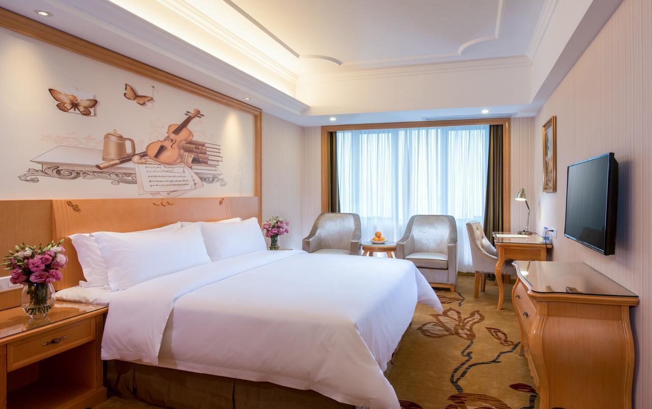 Vienna International Hotel Suzhou University Town Екстер'єр фото