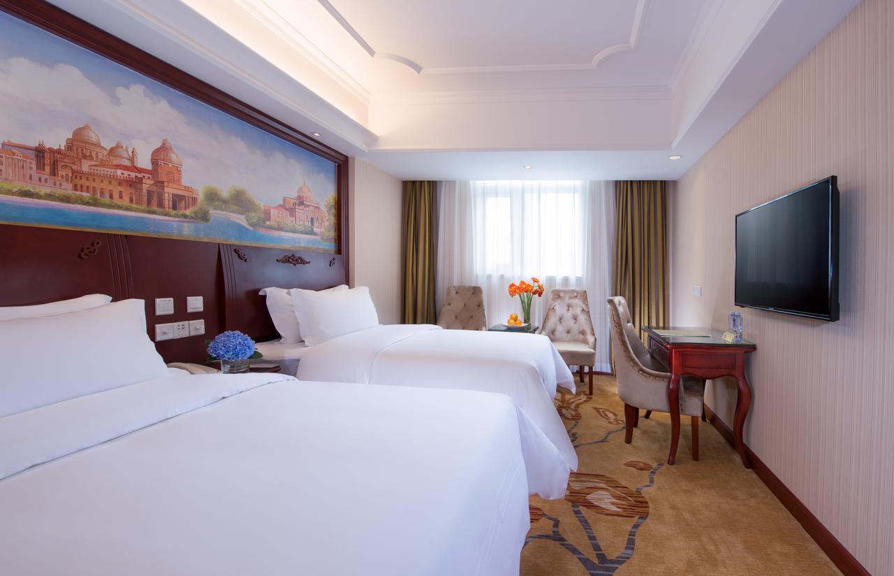 Vienna International Hotel Suzhou University Town Екстер'єр фото